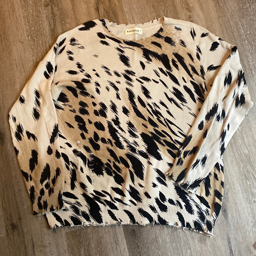 Distressed sweater in animal print, size L